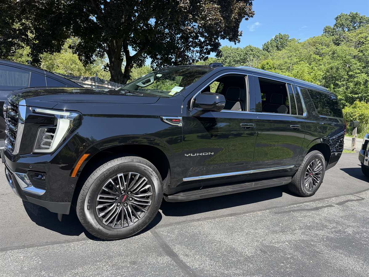 Black GMC Yukon XL, side view — Orange County Limousine, Newburgh NY