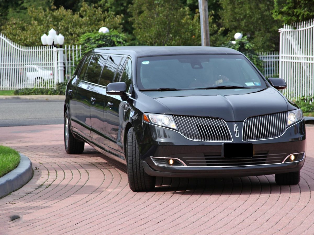 Black Lincoln MKT stretch limousine, front three-quarter view — Orange County Limousine, Newburgh NY