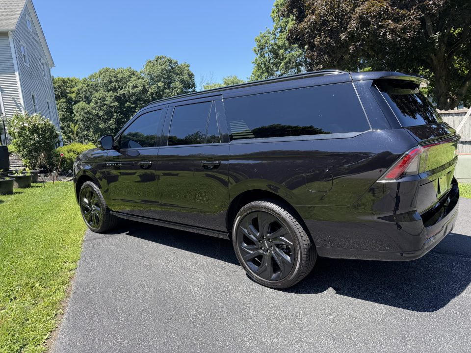 Black Lincoln Navigator Executive seen from the side — Orange County Limousine