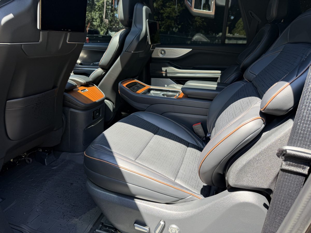 Second-row seating and centre console inside the Lincoln Navigator Executive